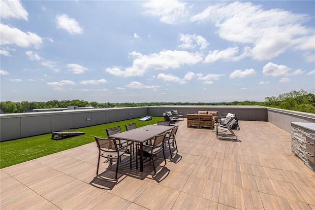 view of patio with fence, an outdoor hangout area, and outdoor dining area