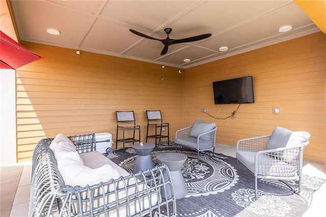 view of patio with a ceiling fan and outdoor lounge area