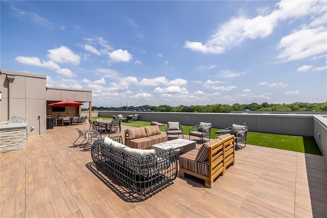 view of patio with an outdoor hangout area and outdoor dining space