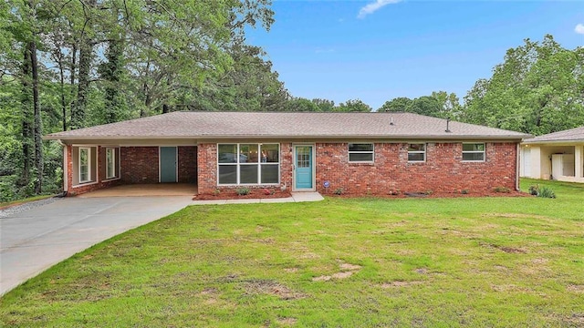 191 Pine St NE, Fairburn, GA 30213 - single story home featuring concrete driveway, a front yard, brick siding, and a carport