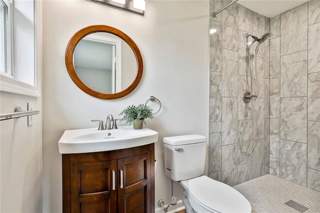 191 Pine St NE, Fairburn, GA 30213 - full bath featuring vanity, a tile shower, and toilet