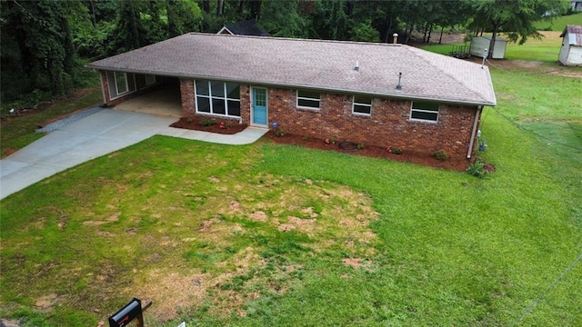 191 Pine St NE, Fairburn, GA 30213 - ranch-style house with driveway, a front yard, brick siding, an attached carport, and roof with shingles
