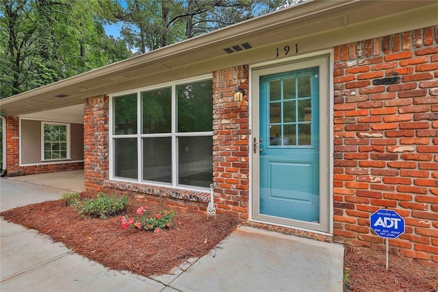 191 Pine St NE, Fairburn, GA 30213 - entrance to property featuring brick siding