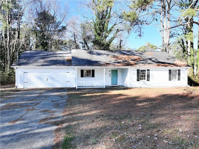 single story home with a garage