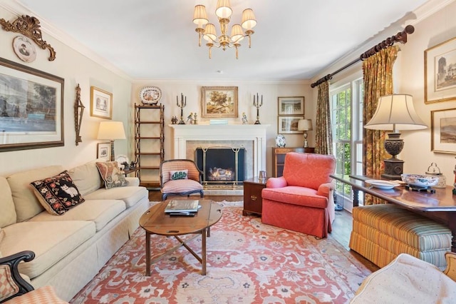 living area with a chandelier, a tile fireplace, ornamental molding, and wood finished floors