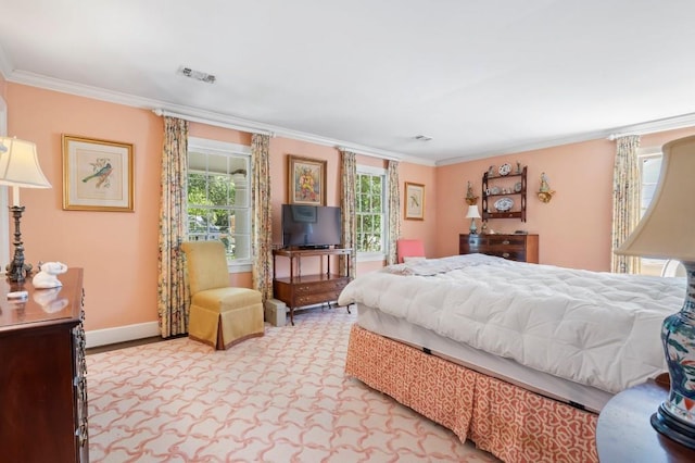 bedroom featuring ornamental molding and baseboards