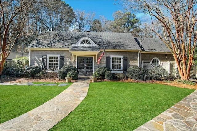 2580 Hyde Manor Dr, Atlanta, GA 30327 - view of front of house with french doors, a front lawn, and roof with shingles