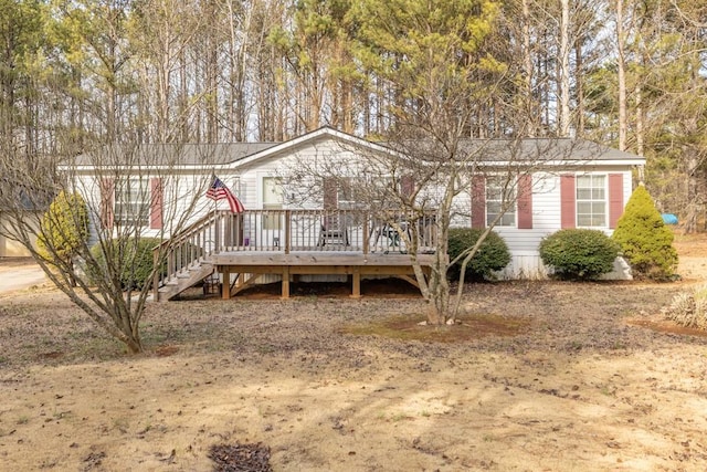 view of front of house with a deck