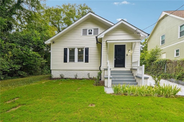 bungalow with a front yard