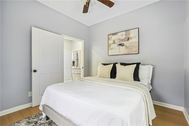 bedroom featuring ceiling fan and hardwood / wood-style floors