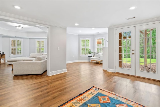 6219 Creekstone Path, Cumming, GA 30041 - living room featuring ornamental molding, wood finished floors, baseboards, french doors, and recessed lighting