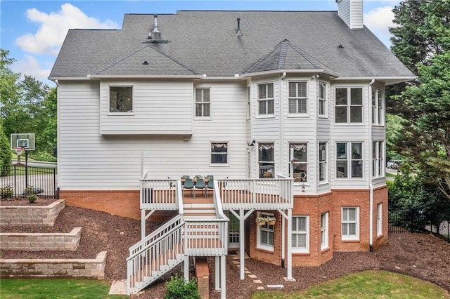 6219 Creekstone Path, Cumming, GA 30041 - back of house with a wooden deck, a chimney, stairs, and a shingled roof
