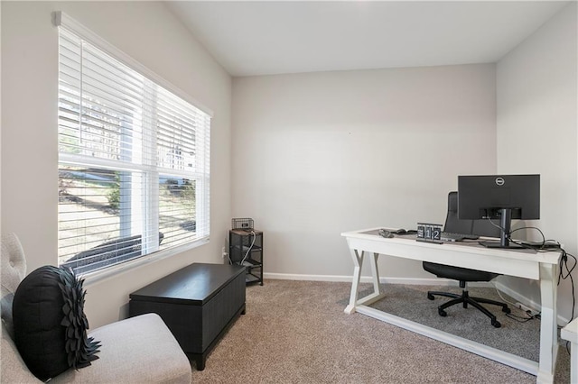 office space with carpet and baseboards