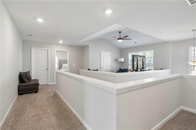 corridor featuring recessed lighting, carpet, and baseboards