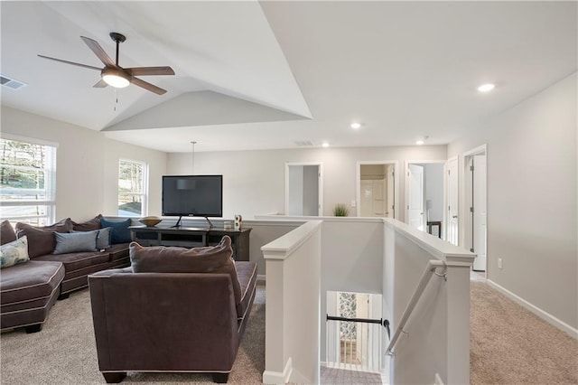 living area with baseboards, carpet, lofted ceiling, recessed lighting, and a ceiling fan