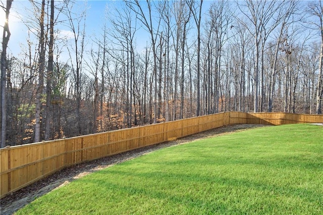 view of yard featuring a fenced backyard