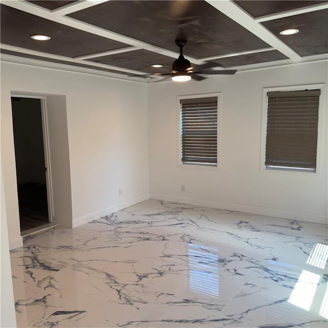 empty room with ornamental molding and ceiling fan