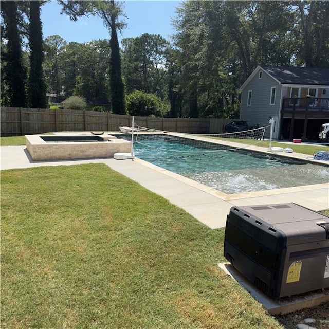 view of pool with a diving board and a yard