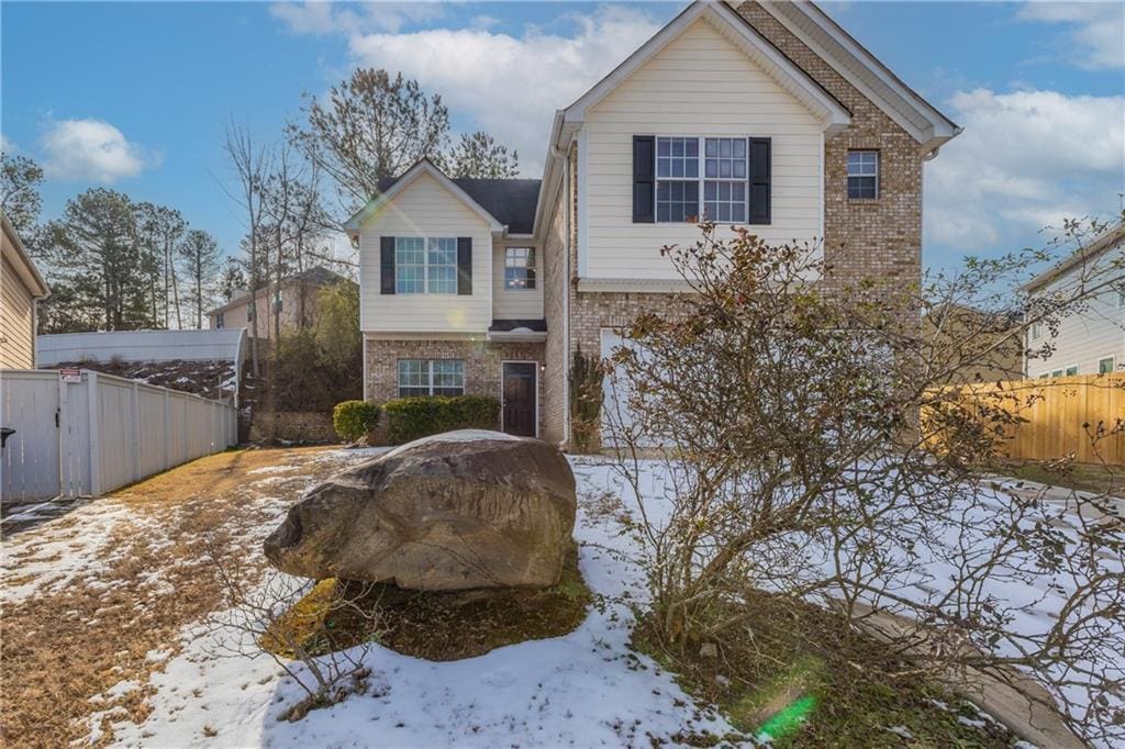 view of snow covered property