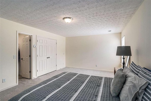 855 Lakeside Cir, Covington, GA 30016 - unfurnished bedroom with carpet, a textured ceiling, a closet, and baseboards