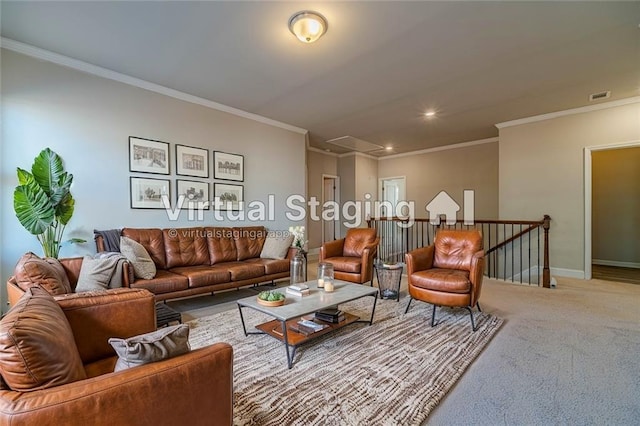 carpeted living area featuring baseboards, visible vents, attic access, recessed lighting, and ornamental molding