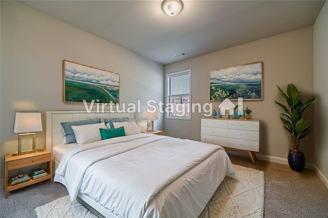 bedroom with visible vents, baseboards, and carpet floors