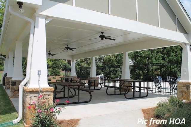 view of patio / terrace featuring a ceiling fan and fence