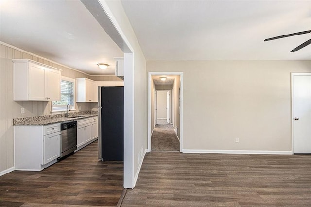 kitchen featuring dark wood finished floors, dishwasher, freestanding refrigerator, white cabinets, and a sink