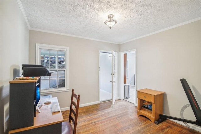 home office featuring crown molding, a textured ceiling, and hardwood / wood-style flooring