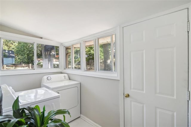 laundry room featuring separate washer and dryer