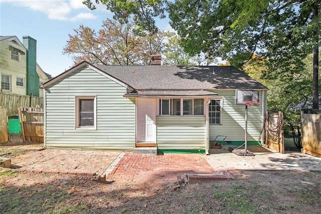 rear view of house with a patio area