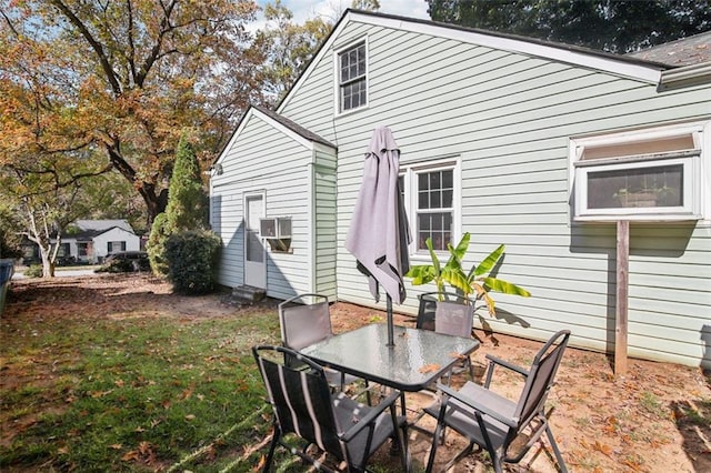 back of property featuring a patio area