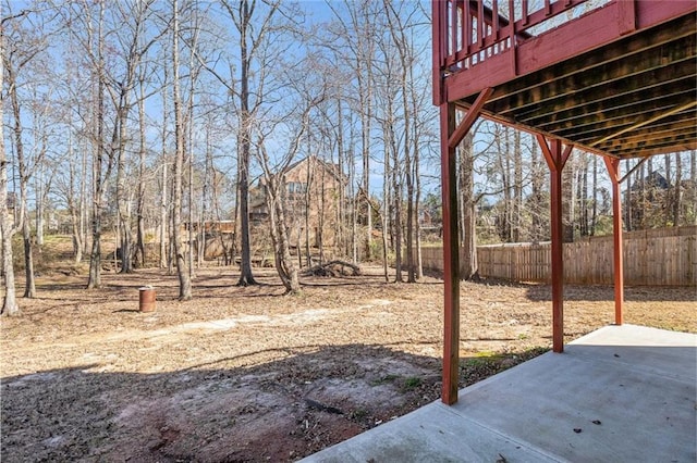 view of yard with a patio and fence