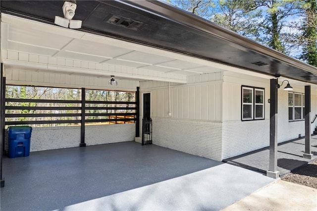 garage featuring a carport