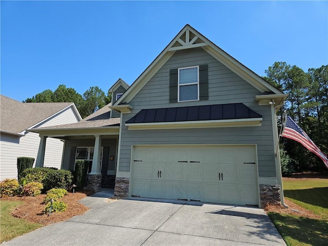 craftsman inspired home with a garage