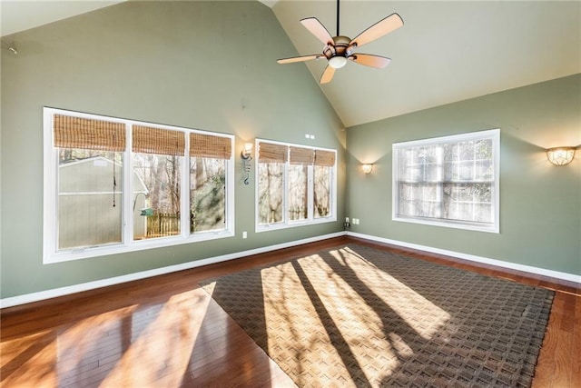 unfurnished sunroom featuring ceiling fan and lofted ceiling