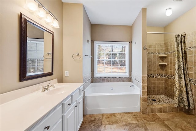 bathroom featuring vanity, tile patterned floors, and independent shower and bath