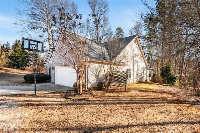 view of property exterior with a garage