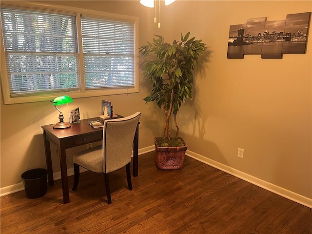 office with wood finished floors and baseboards