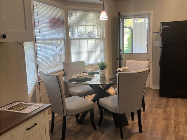 dining room featuring light wood-type flooring