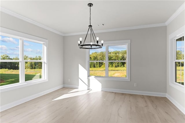 unfurnished dining area featuring light hardwood / wood-style flooring and a wealth of natural light