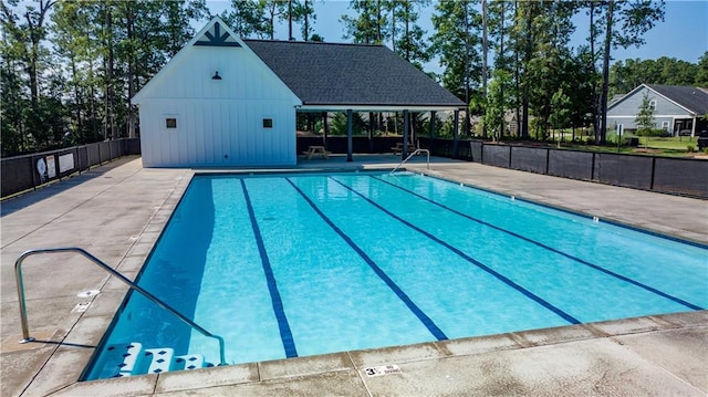 view of pool featuring a patio