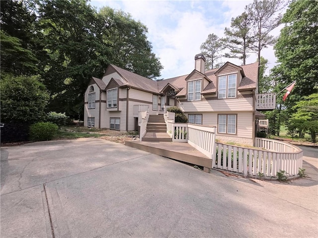 view of front of home with a chimney