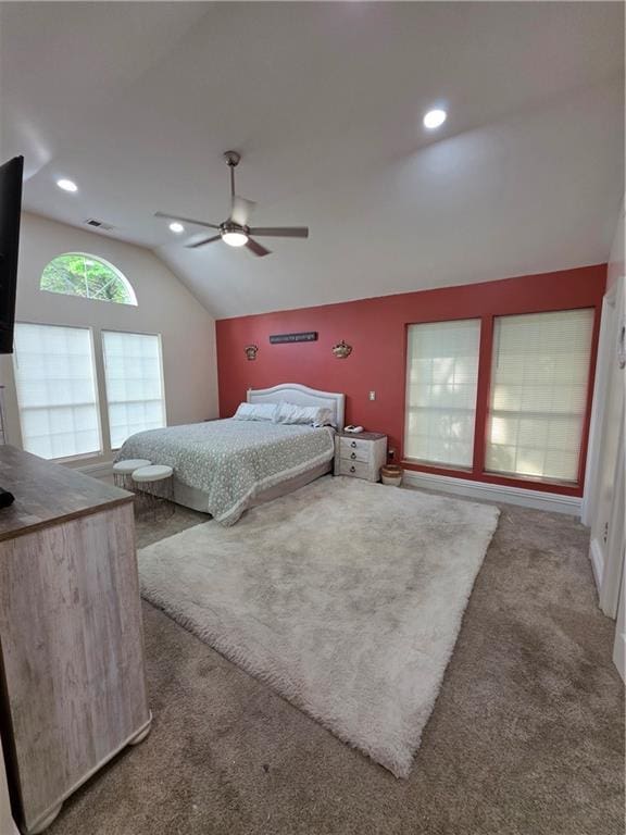 carpeted bedroom with visible vents, ceiling fan, recessed lighting, and vaulted ceiling