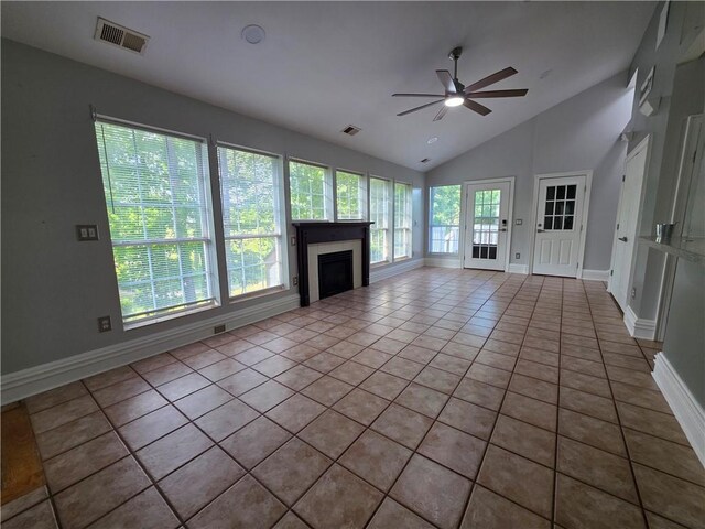 200 Valley Brook Dr, Newnan, GA 30265 - unfurnished living room featuring a ceiling fan, tile patterned floors, vaulted ceiling, a fireplace, and baseboards