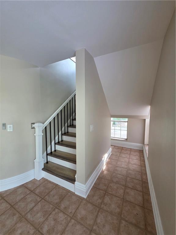 200 Valley Brook Dr, Newnan, GA 30265 - stairs with baseboards