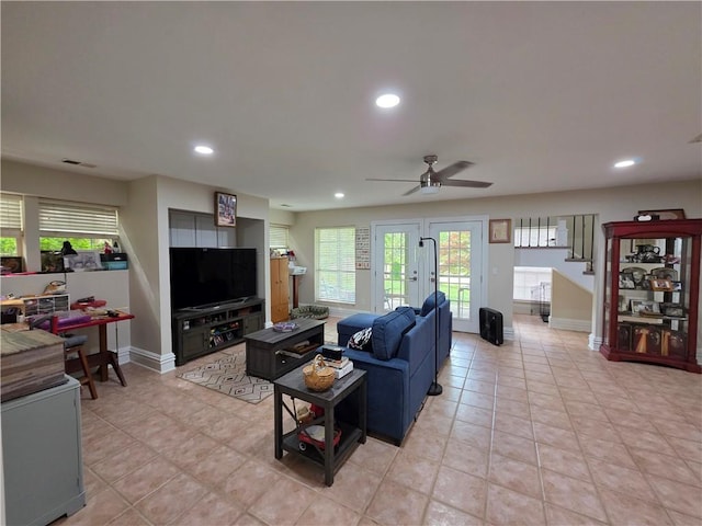 living room with a healthy amount of sunlight, a ceiling fan, and recessed lighting