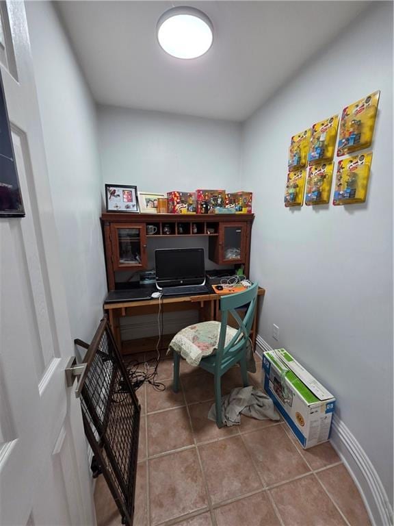 office space featuring tile patterned flooring