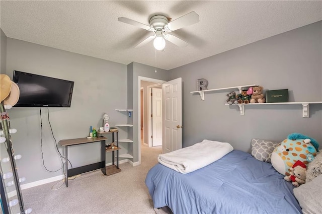 2165 Shillings Chase Dr NW, Kennesaw, GA 30152 - bedroom with light carpet, baseboards, a ceiling fan, and a textured ceiling