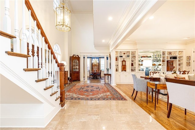 3022 Loridan Way SE, Atlanta, GA 30339 - entryway with ornamental molding, stairway, a chandelier, recessed lighting, and a high ceiling